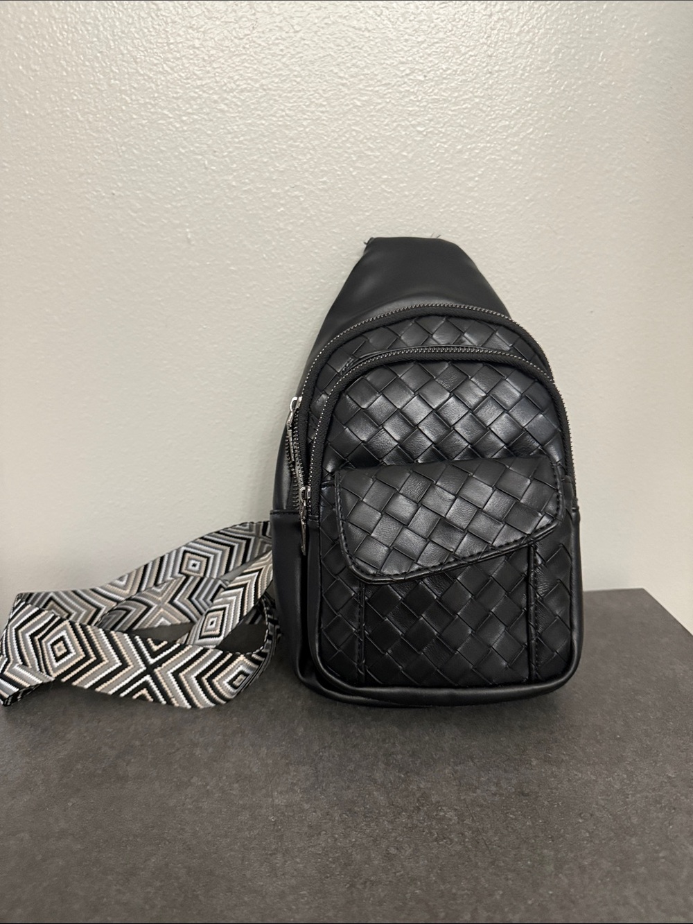 Catherine Malandrino Black Woven Sling Bag with Patterned Strap